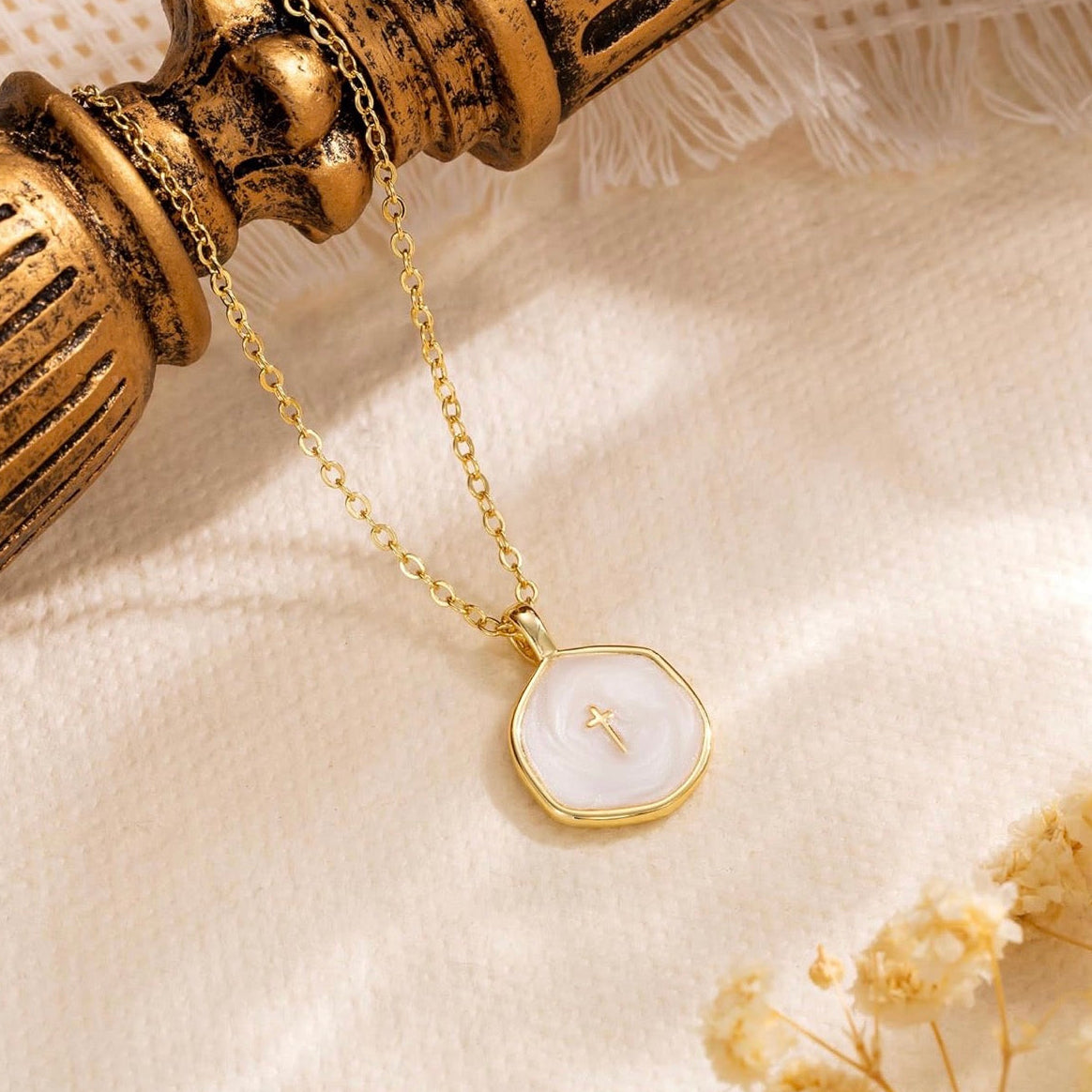 “He is.” 14k Cross Swirled Enamel Charm Necklaces