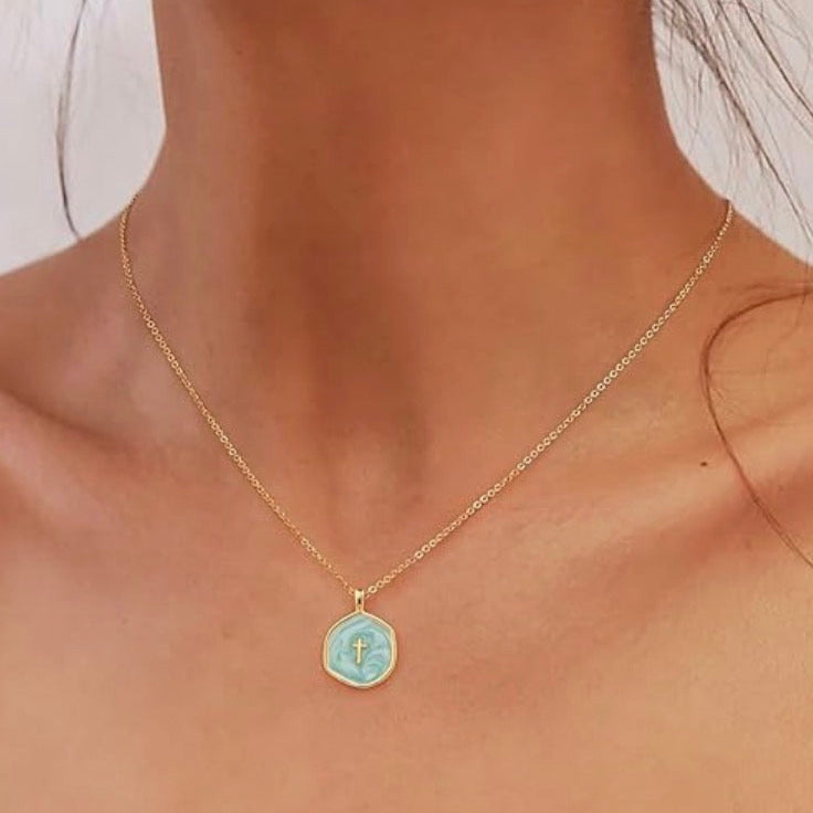 “He is.” 14k Cross Swirled Enamel Charm Necklaces