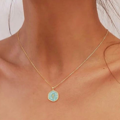 “He is.” 14k Cross Swirled Enamel Charm Necklaces