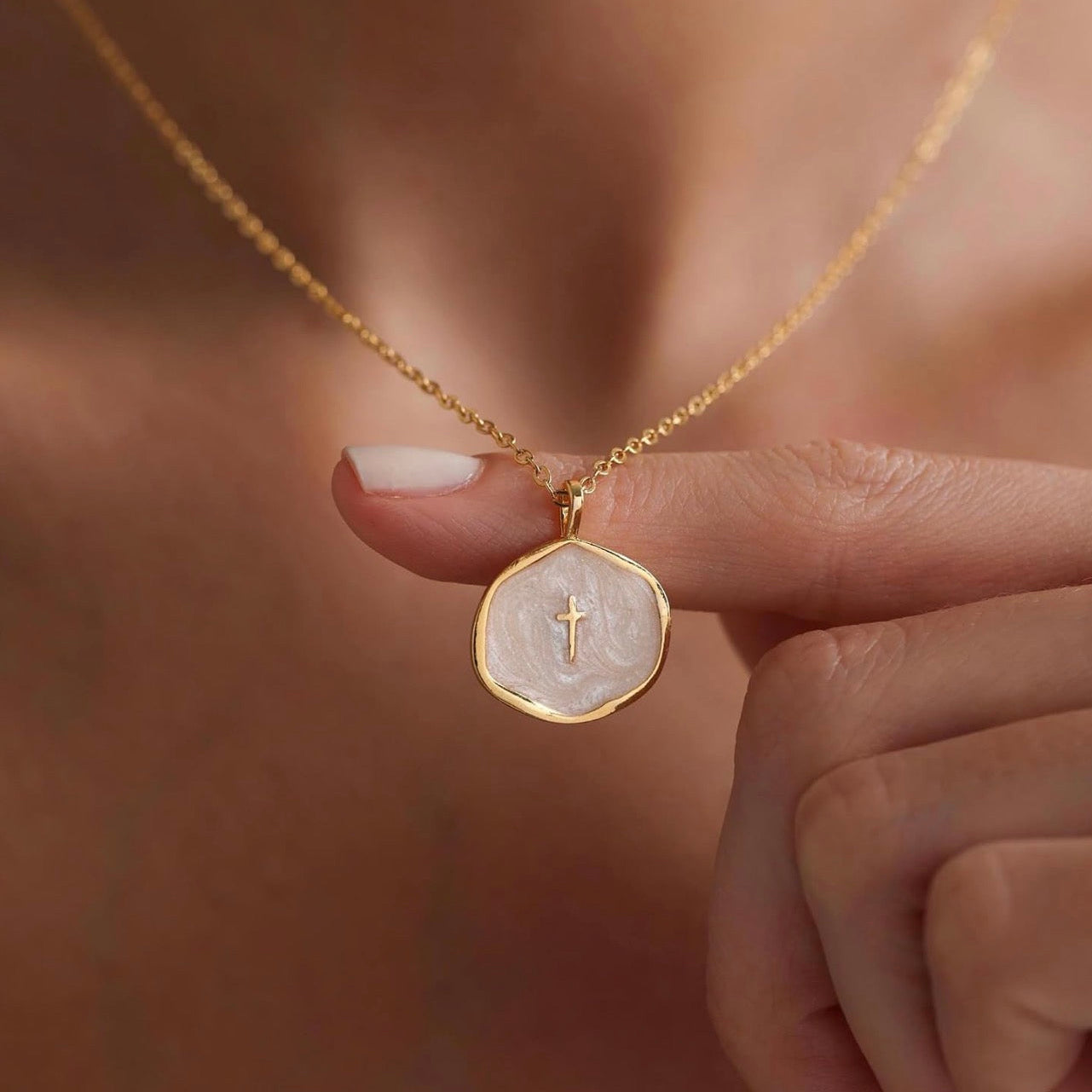 “He is.” 14k Cross Swirled Enamel Charm Necklaces
